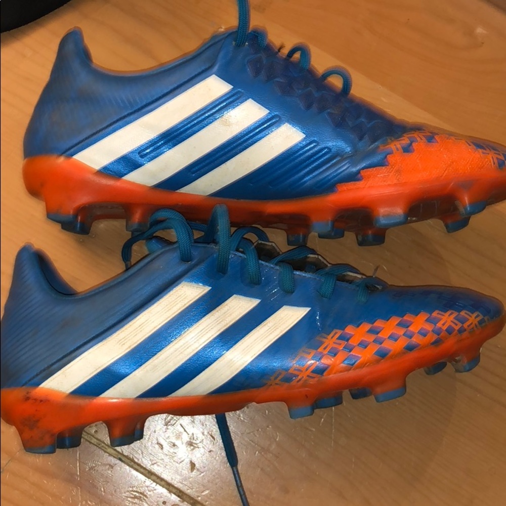 Blue and orange adidas cleats